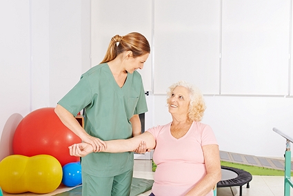 Image: Rehabilitation Therapist with a patient.